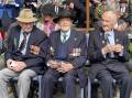 Veterans Alister Pankhurst, Ron Vickress and John Bentley attended the Armidale Anzac Ceremony along with thousands of locals. Picture Heath Forsyth 