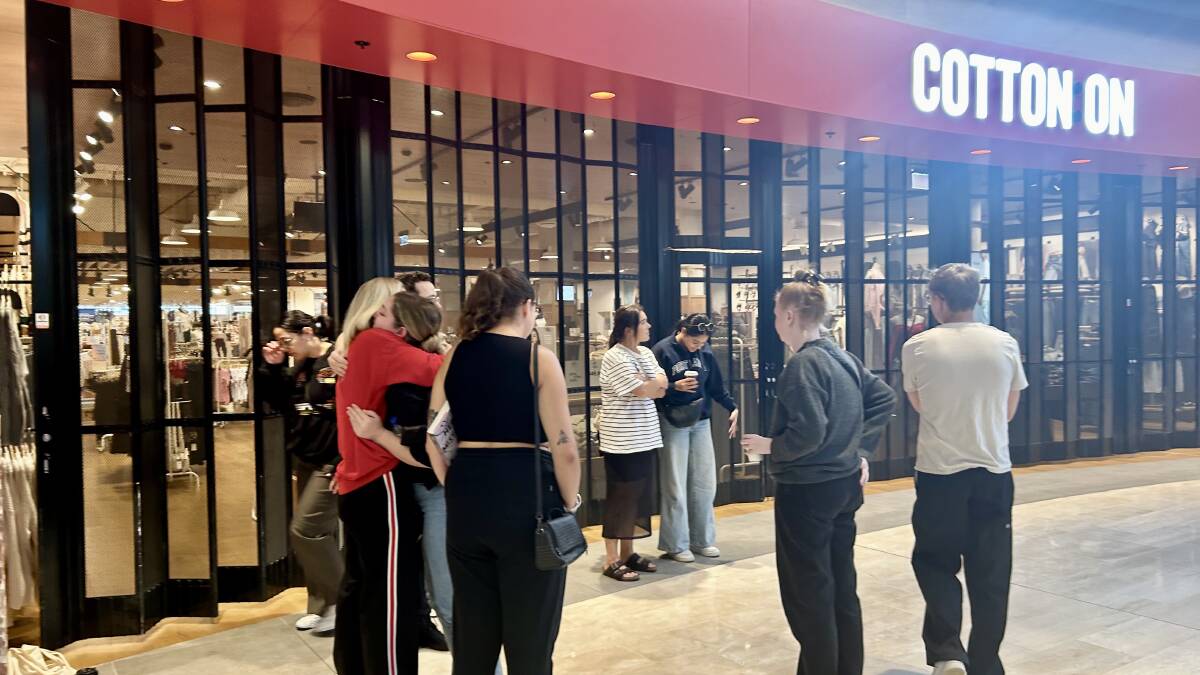 There were sombre scenes inside Westfield Bondi Junction on Thursday for the reopening of the centre. Picture by Carla Mascarenhas
