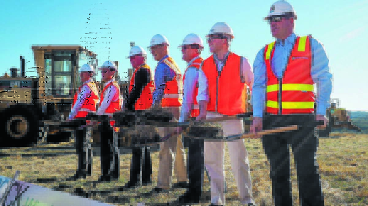 CONSTRUCTION STARTS: Barnaby Joyce, third from the left, joins in the sod turning ceremony at the Sapphire Wind Farm.