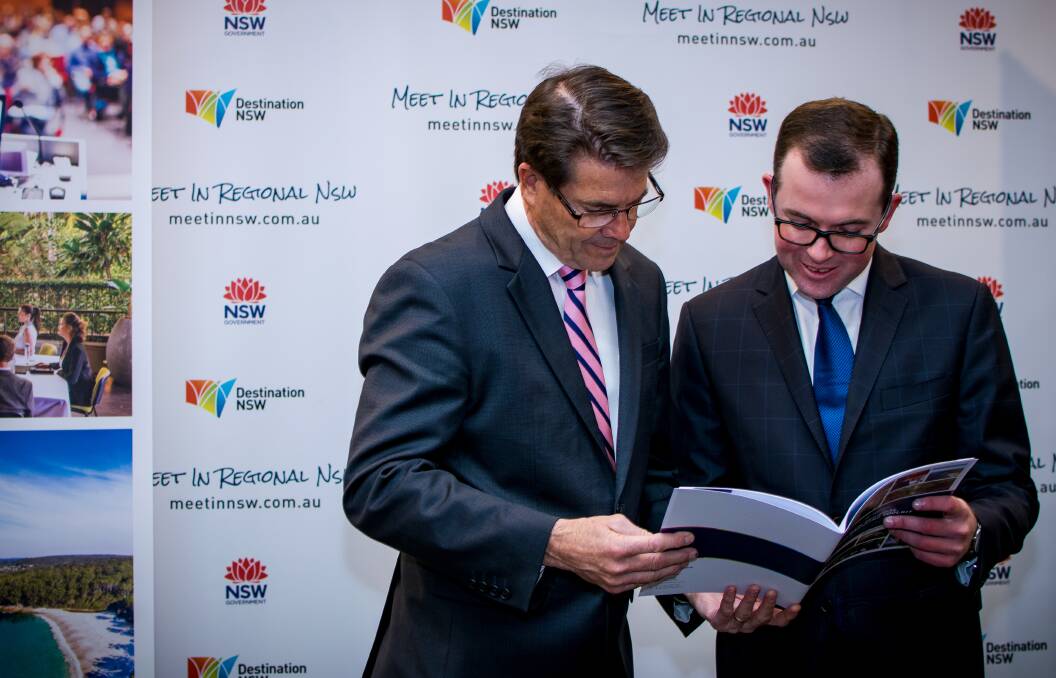 BIG BUSINESS: Tamworth MP Kevin Anderson and Tourism Minister Adam Marshall check out the new strategy. Photo: Simon McCarty