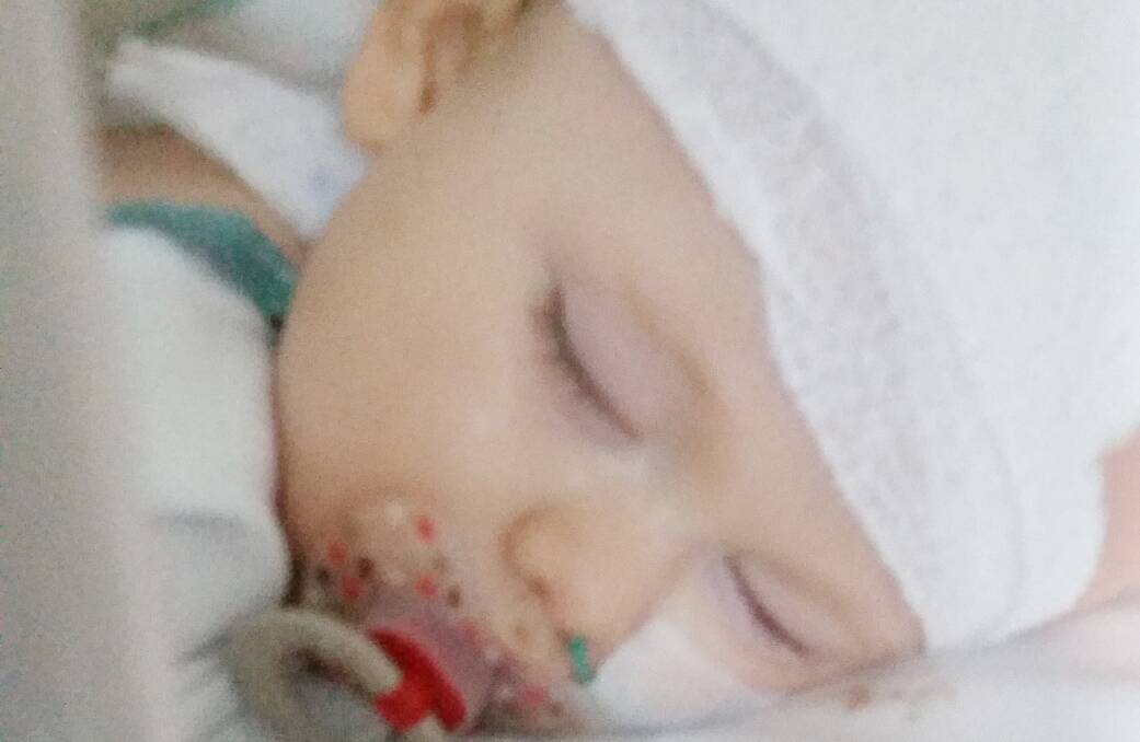'HEARTBREAKING': Jett Hamley, a couple of hours after surgery to remove a rare cancer from the 13-month-old's brain stem. Picture: SUPPLIED