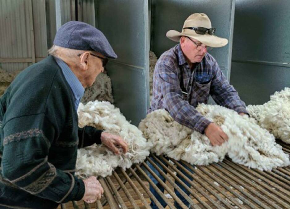 New England Merino Field Days president Tim Bower, pictured with his father Kevin during shearing.