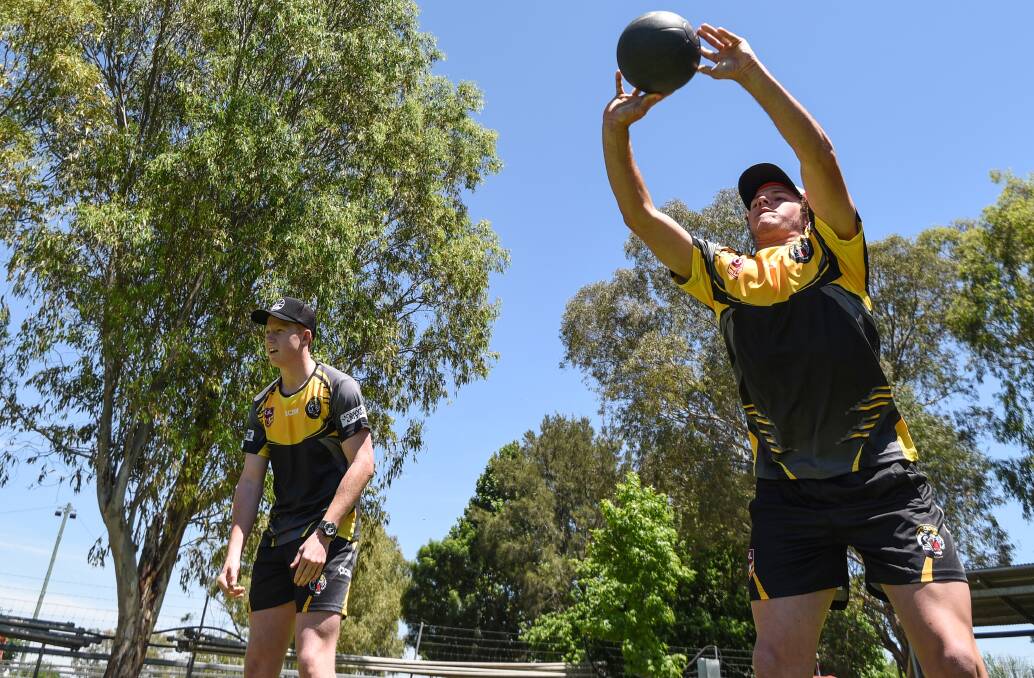 Heads up: Glen Innes' Alex Fisher and Quirindi's Ben Fechner soaked up the sun as the Tiger juniors hit the fitness testing. Photo: Gareth Gardner 201116GGD02