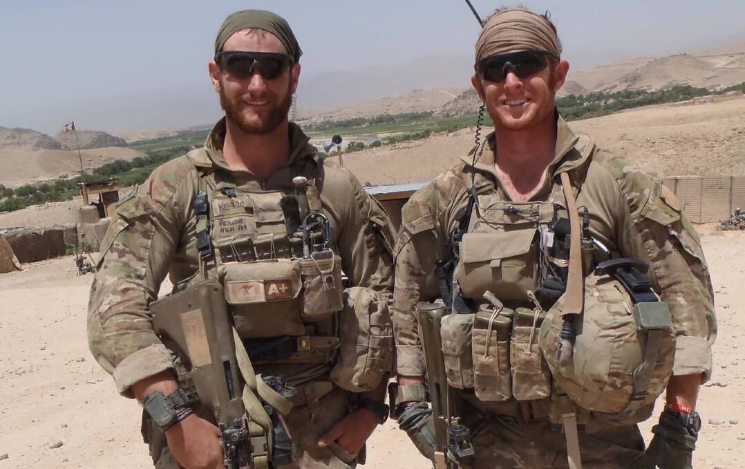 Corporal Robert Prowse, left, during a tour of duty.