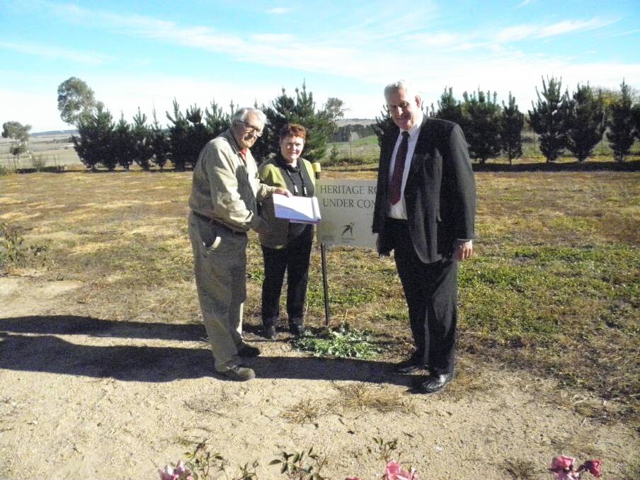 SET TO GROW: Heritage Rose Garden project manager Richard Bird, co-chair of AGHS Helen Oates and Armidale Regional Council Administrator Ian Tiley at the garden.