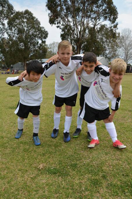 ON THE WORLD STAGE: Armidale juniors, Evan Kwan, Jordan Marshall, Tommy Schaefer and Bryan Kallosche, joined an Inverell side at the Mini World Cup this week.
