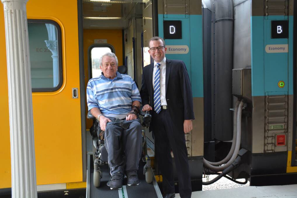 Northern Tablelands MP Adam Marshall tests out the new access ramp with access advocate Steve Austin.