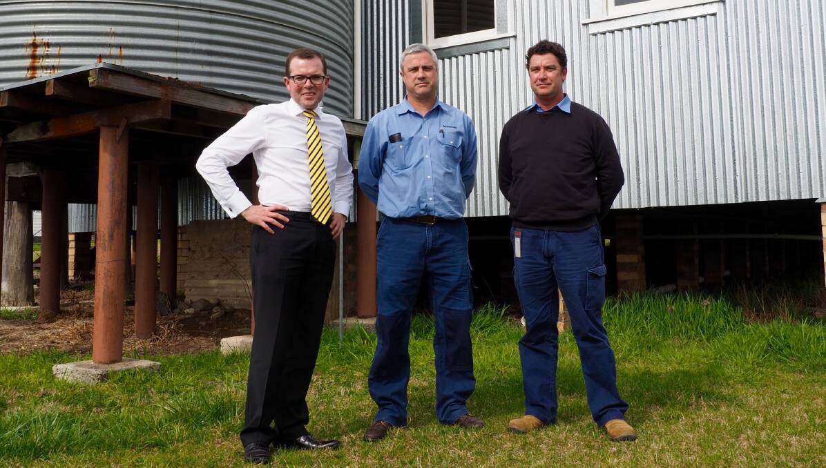 Northern Tablelands MP Adam Marshall, left, with Armidale Regional Council properties staff Bernard Maurer and Dave McMillen at the rear of the Hillgrove Community Hall.