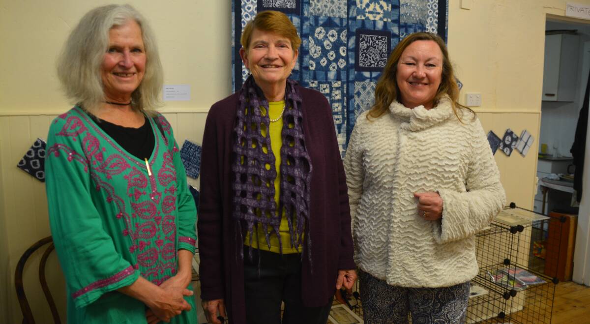 Rhonda Ellem, Enid Taylor and Lizzie Horne at Friday evening's exhibtion opening.