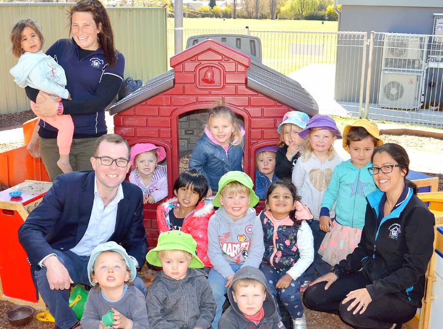 Northern Tablelands MP Adam Marshall with students at Little Bear Cottage and staff members, Liz Delaney (standing) and centre director Febi Snape.