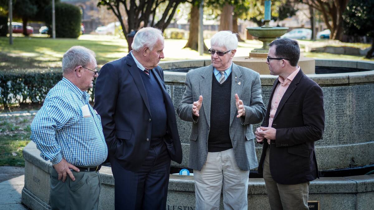 COMMEMORATION: Max Tavener, RSL Armidale sub-branch president, Armidale Regional Council Administrator Dr Ian Tiley, Rod Davis, RSL Armidale sub-branch vice-president and Member for Northern Tablelands Adam Marshall discuss the plans for the new plaques at the cenotaph in Armidale’s central Park.