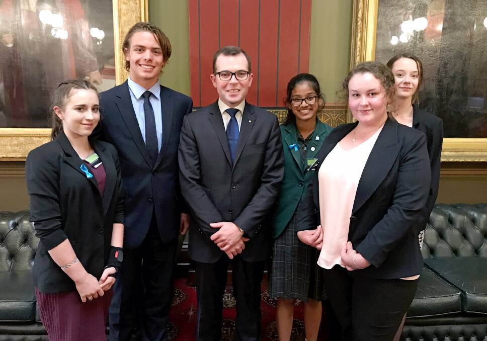 Northern Tablelands Youth MPs pictured with their ‘senior’ colleague Adam Marshall in Parliament last week, Caitlin Schuman, left, Jesse Streeting, Thurkka Jeyakumar, Jasmine Robinson and Gemma Weguelin.