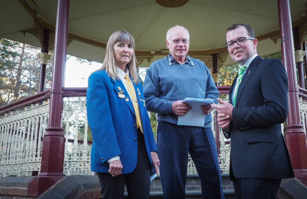 HARD TO BEAT: Armidale City Band musical director Robyn Shanahan and band President Ken Peter, discuss funding to help isolated musicians with Adam Marshall.