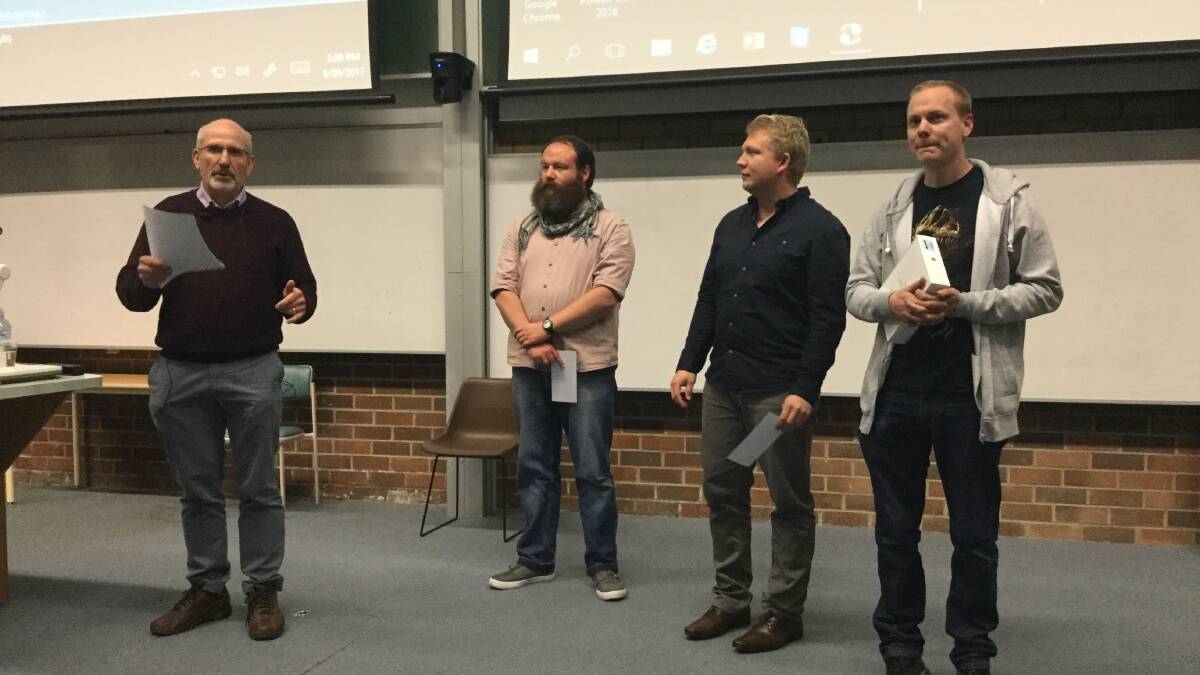 RESEARCH REVELATIONS: Dr Philip Thomas with the top three students in the thesis competition, Gary Marriner, Julian Klepp and winner Lachlan Hart.