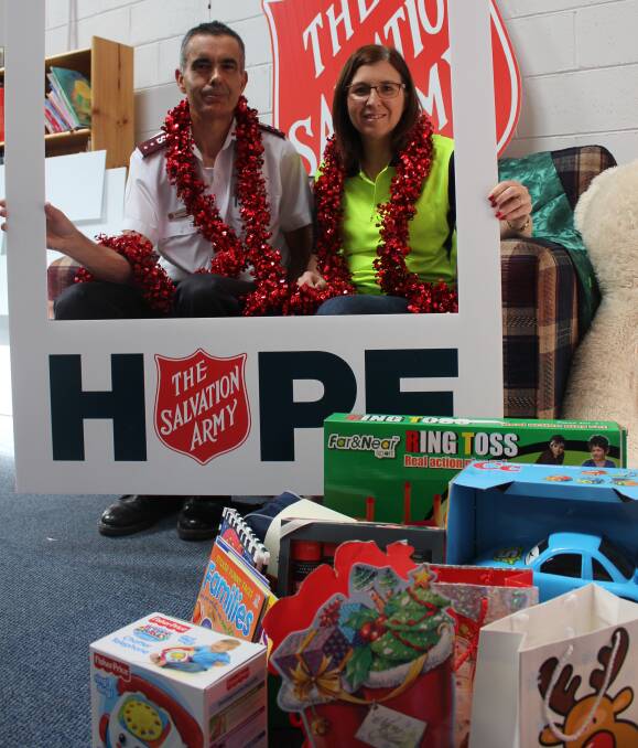 Good cause: Armidale Salvation Army workers Captain Dale and Darlene Murray kick start the Christmas Cheer initiative. 