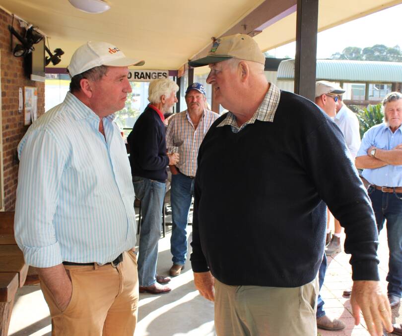 Backpacker boost: Deputy Prime Minister and Member for New England Barnaby Joyce and Ridley Bell of Mountain Blue Farms, Tabulam.