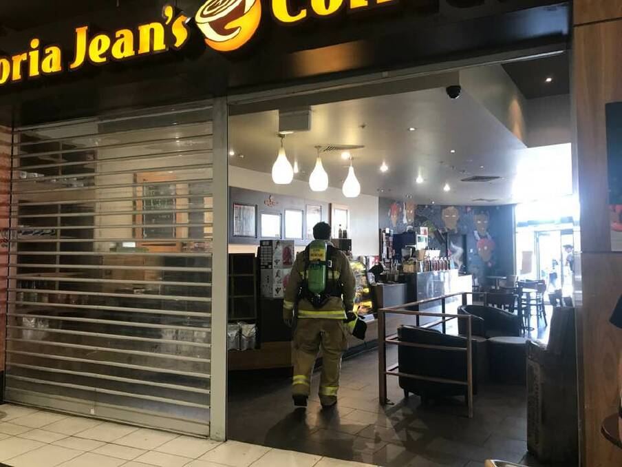CHAOS AT THE SHOPS: Hundreds of shoppers were evacuated from Armidale Central on Sunday morning after a burnt Glora Jean's Waffle sparked a fire alarm. Photo: Rachel Baxter