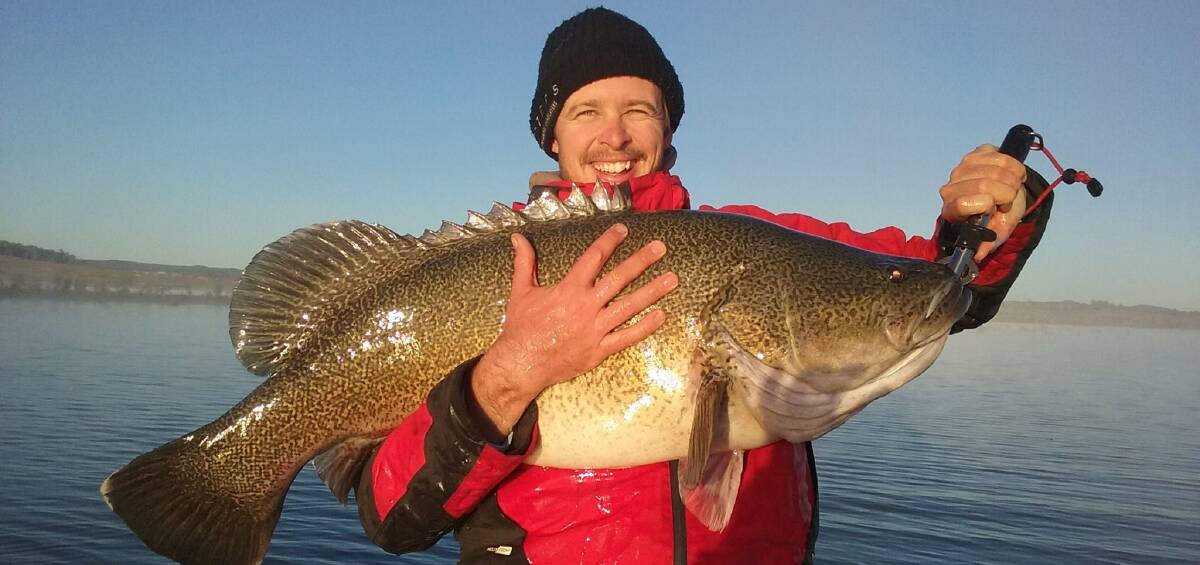 OFF THE HOOK: Fisherman Sean Doyle proudly showing off his Murray Cod at Copeton Dam earlier this month, just a taste of what's to come for fishing fanatics this season.