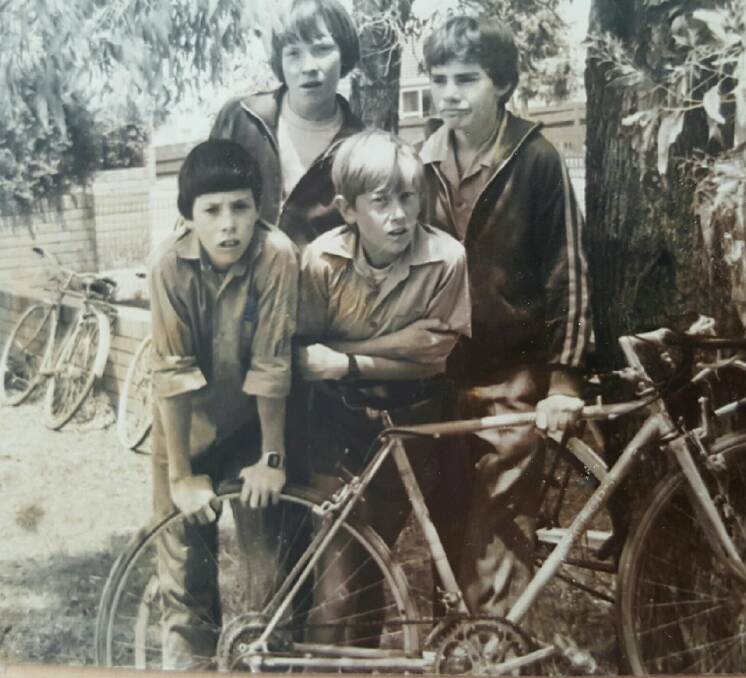 Friends forever: Phillip Moffatt with Michael Hartmann and some other friends at Guyra Central School in the 1980s.