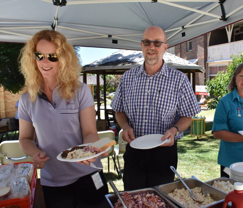 LOVELY LUNCHEON: Delicious salads and a sausage sizzle helped staff celebrate what has been a busy and successful year.
