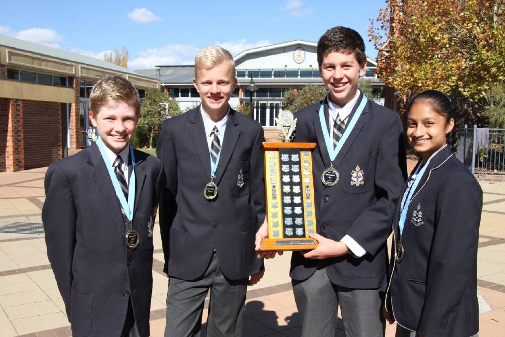 LOCAL WINNERS: TAS students Alexander Gibson, Jack Van Roy, Henry Mitchell and Piyumi Ekanayake were the champion team at UNE Year 8 Maths Day on Friday.