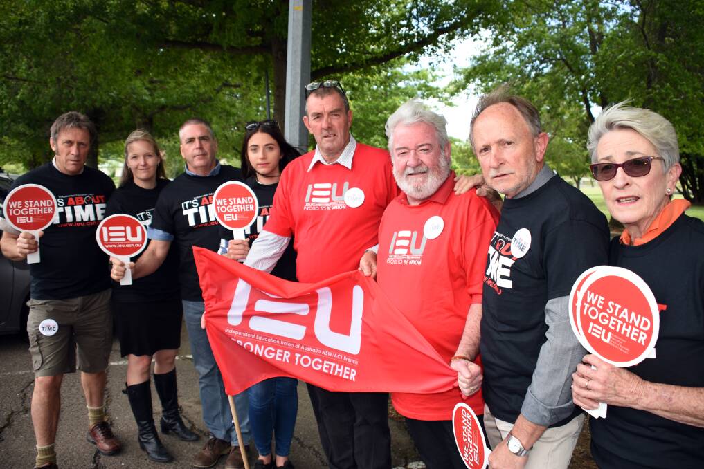 FIGHTING FOR BETTER: Teachers from Armidale's O'Connor Catholic College and St Joseph's Primary School in Uralla stopped work on Monday to fight for their right to arbitration. Photo: Rachel Baxter.