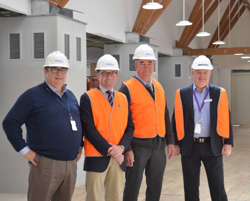 FULL THROTTLE: Armidale Regional Airport Operations Manager, Tim Weeks, Northern Tablelands MP Adam Marshall, Mayor Simon Murray and Council CEO Peter Dennis touring the final stages of the airport upgrade on Monday morning. Photo: Rachel Baxter.