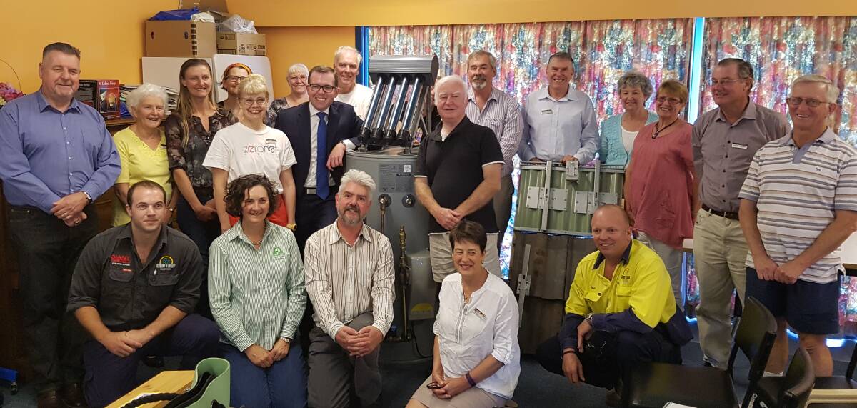 Bulk buy: Community members attend the launch of a second bulk-buy of evacuated tube solar hot water systems in Uralla on Wednesday.