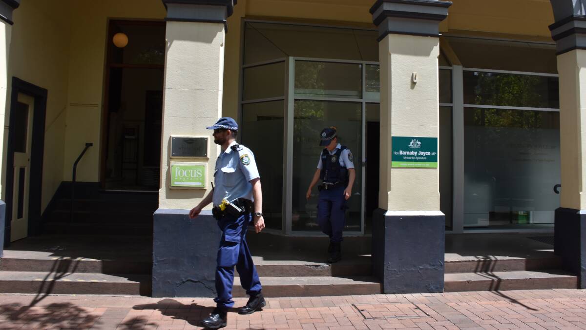 SUSPICIOUS PACKAGE: Police outside Barnaby Joyce's Armidale office following reports a suspicious package had been delivered on Friday afternoon.