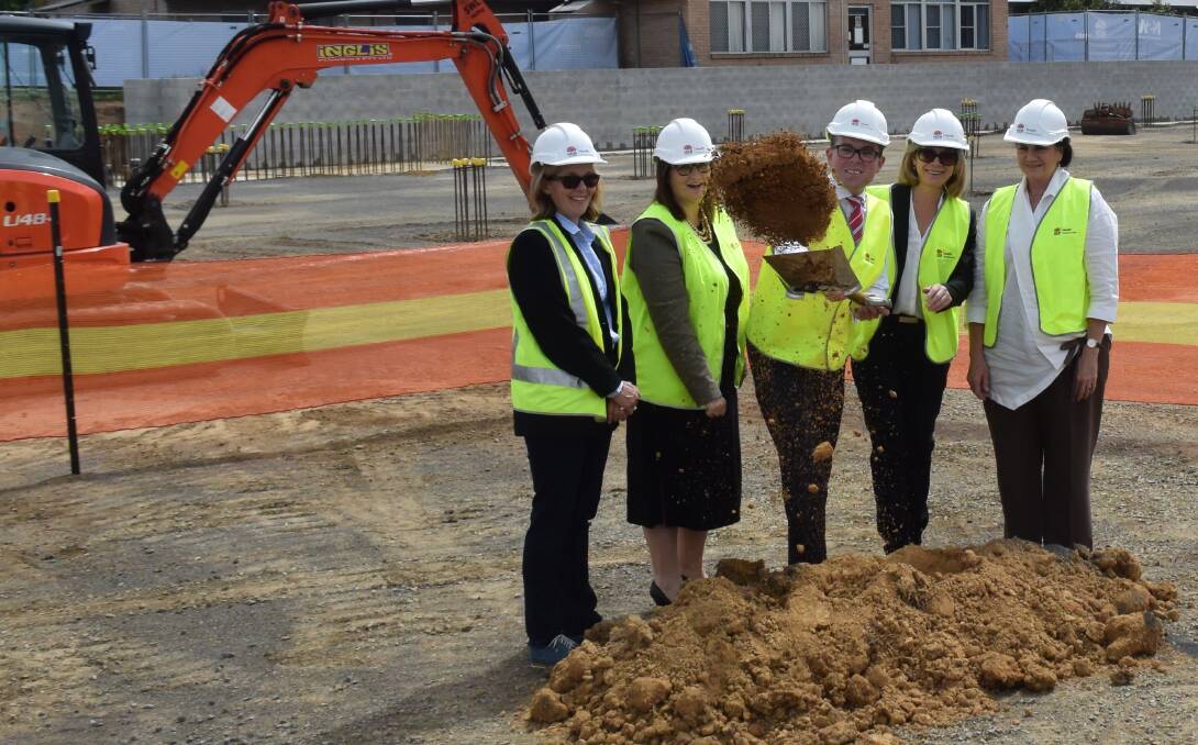 Digging in: Northern Tablelands MP Adam Marshall joins department of health representatives and clinicians for the official sod turning ceremony.