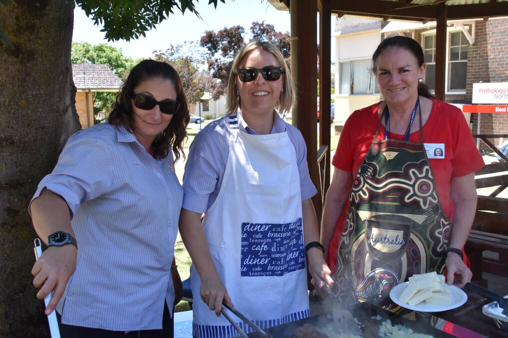 CHRISTMAS CHEER: Staff at Armidale Hospital enjoying a barbecue yesterday to celebrate Christmas.