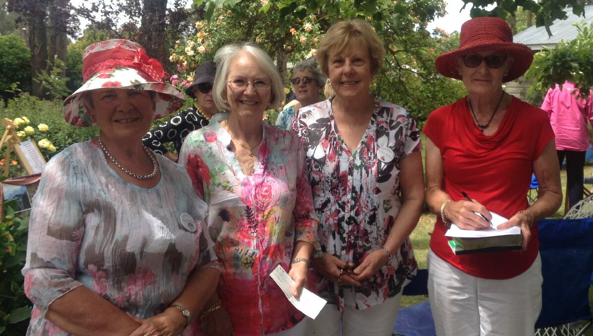 Gathering: Members of the Guyra Garden Club committee, Sue Adams, Shelley Harvey, Robyn Jackson and Sue Campbell at the open garden.