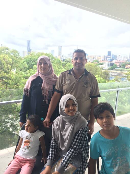 Achieving his dream: Nabeel Alzuwaid and his family have found a new life and safety through his studies in Australia.
