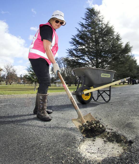 FIXING A HOLE: Carol Sparks is on a mission to fill in the potholes in Glen Innes