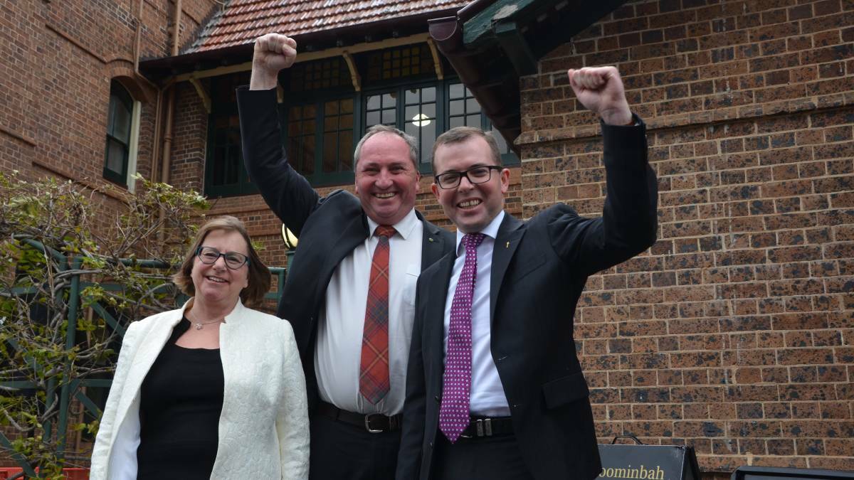 WIN: From left, UNE vice-chancellor Annabelle Duncan, deputy Prime Minister Barnaby Joyce and Northern Tablelands MP Adam Marshall at the announcement in June.