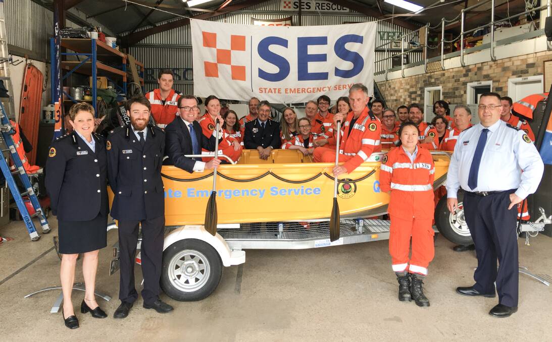 NEW TOY: Armidale's SES unit has received a huge boost with the presentation of a brand new flood rescue boat.