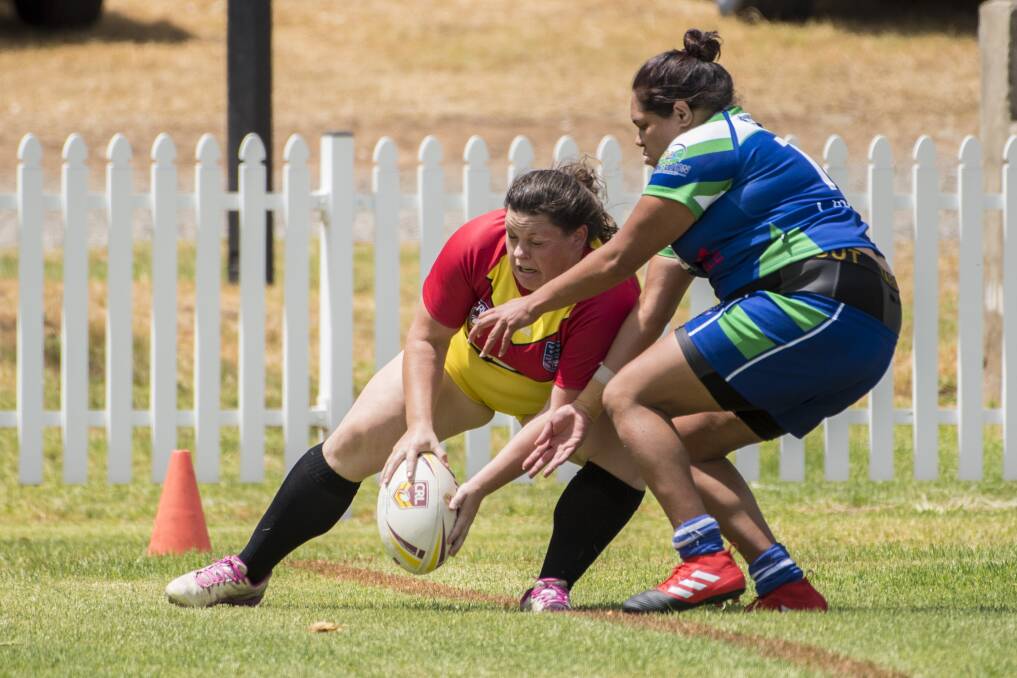 BATTLE: Armidale struggled with a lack of numbers in the third round of the North West women's rugby league nines. 