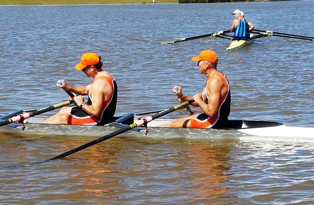 ROWING FOR GOLD: Tim Rogers and John Grant raced their way to a podium finish at the Queensland Masters Rowing Championship on the weekend. 