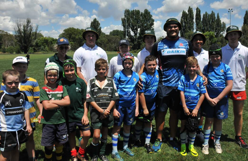MEET AND GREET: Junior rugby stars were excited to meet injured NSW Waratahs player Angus Ta'avao at the National Rugby Camp at SportUNE.