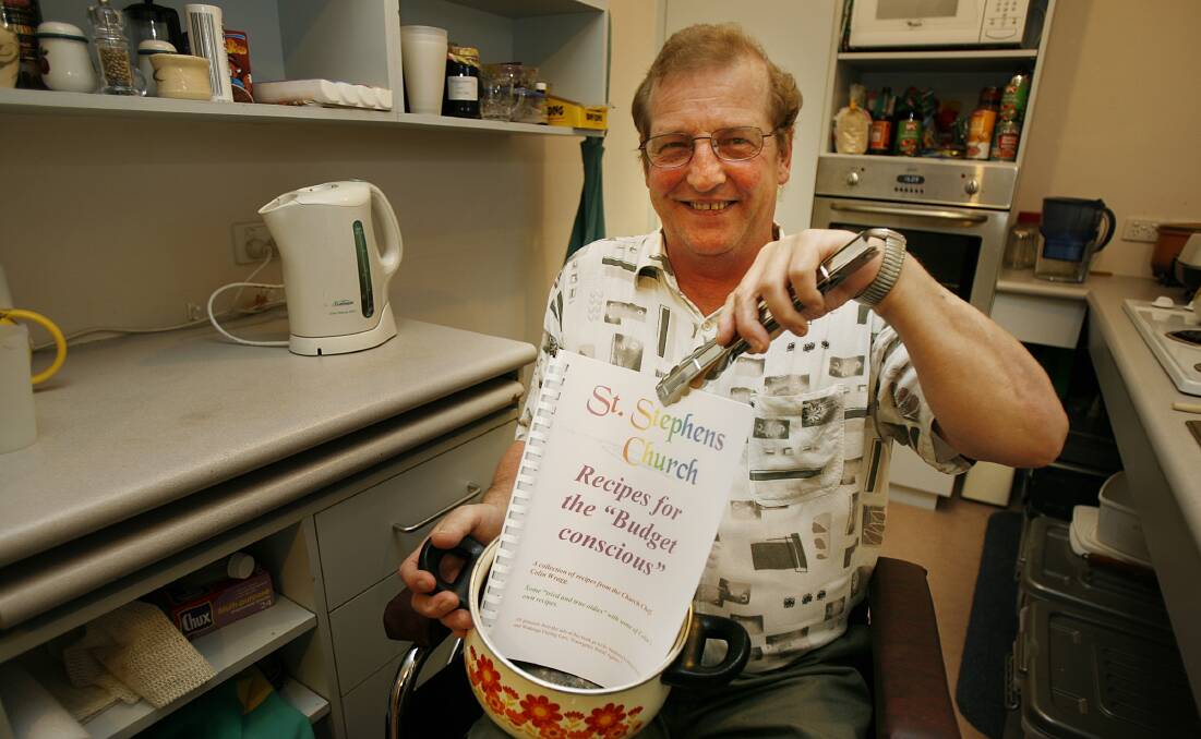 Proud chef: Colin Wragg in 2007 with his Recipes for the Budget Conscious, compiled while he ran cooking classes at St Stephen's Uniting Church in Wodonga. 
