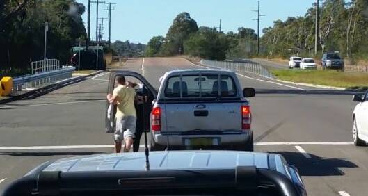 Two people were involved in an argument on the M1 at Lake Munmorah. 