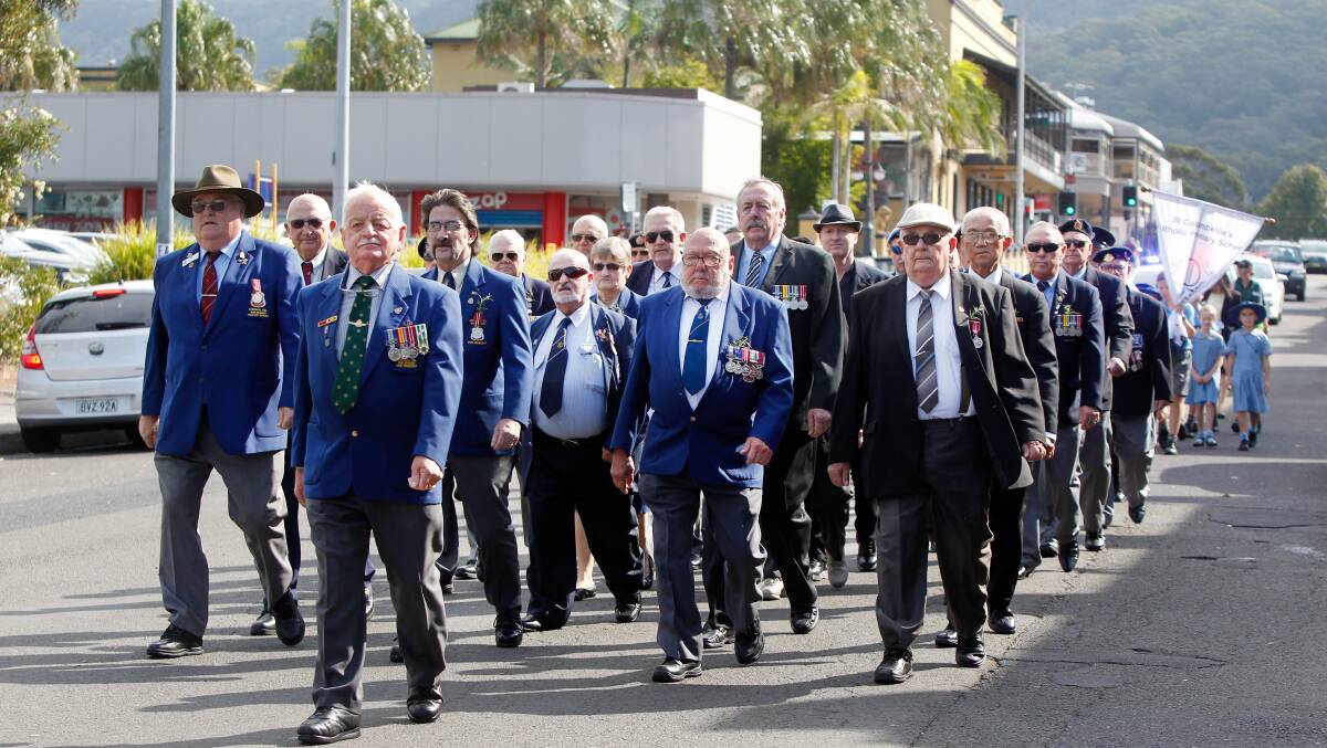 INSULT: The 2016 Corrimal march shows the Anzacs where they should be - marching in the middle of the main street. Picture: Sylvia Liber.