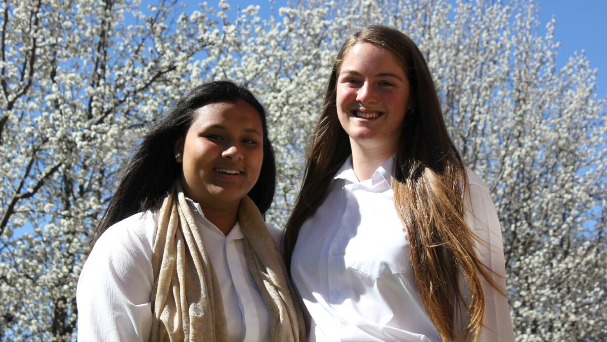 ALTRUISTS: Armidale High School student Riya Thapa has been awarded a Dame Marie Bashir Peace Prize for rebuilding a school in Nepal, her friend Georgie Cooper went along to help. 