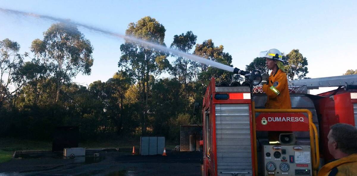 FIRED UP: Firefighters from Armidale Fire and Rescue NSW and the Dumaresq Rural Fire Service joined forces for an evening of training.