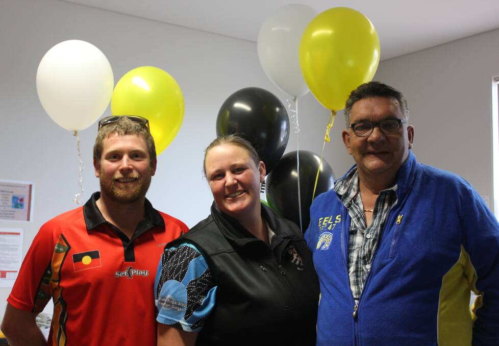 ARMAJUN CELEBRATES: Nurse Tim McGeoch, practice manager Abby Croft and Advisory Committee board member Kenneth Froone celebrated the one year anniversary of the Armajun Health Service.