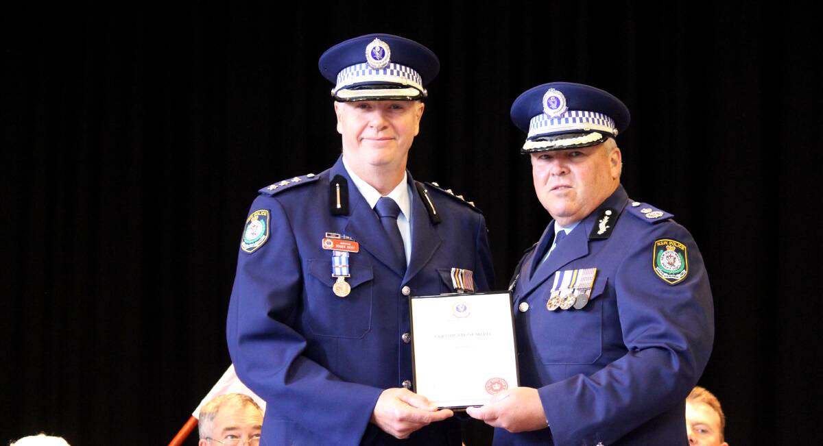 AWARDS CEREMONY: New England LAC Inspector Roger Best receiving a Certificate of Merit from Deputy-Commissioner Regional NSW Field Operations Gary Worboys APM.