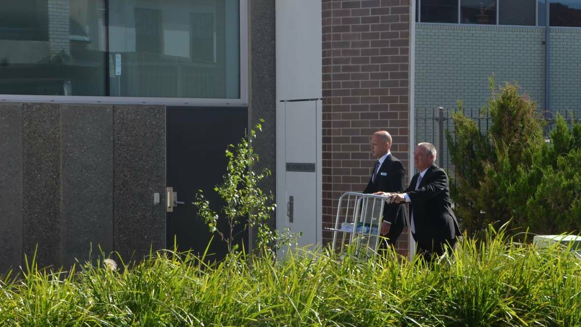 JAIL: A New England detective and police prosecutor arrive at Armidale Local Court.