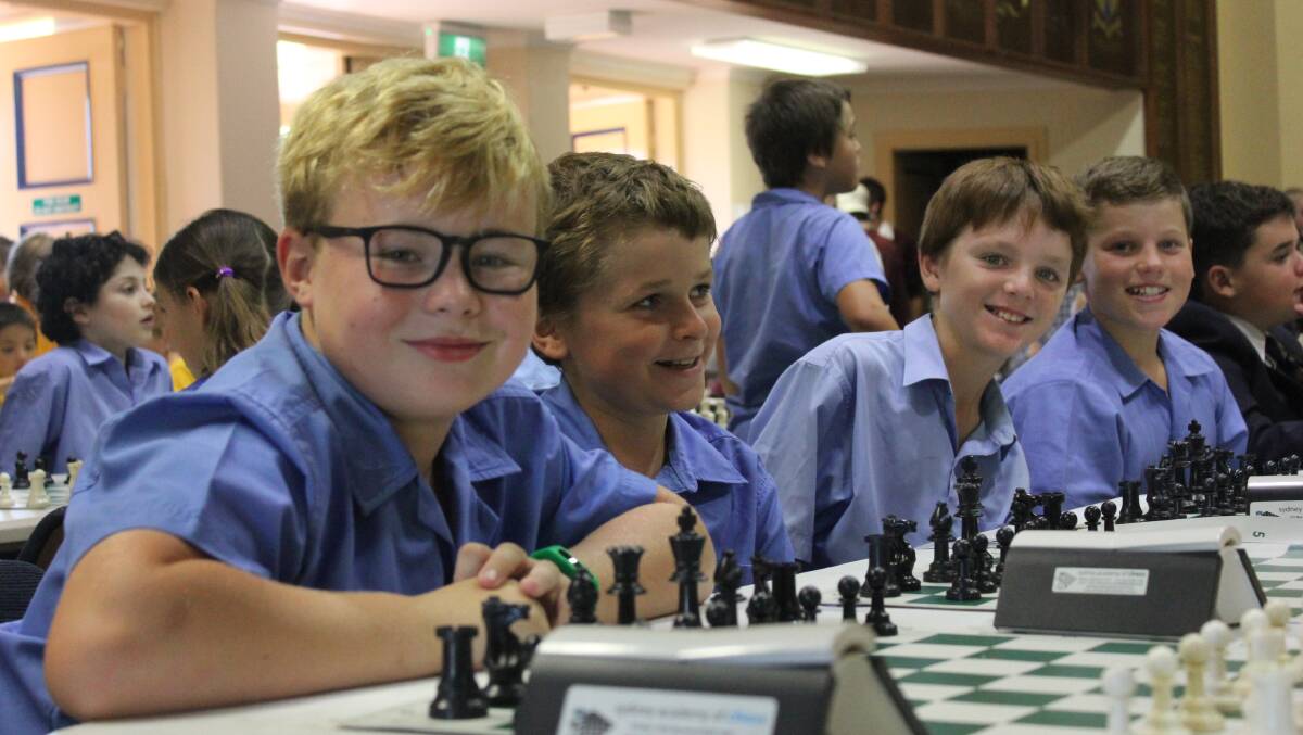 CHECKMATE: Timbumburi Public School students prepare to start their first game of the Sydney Academy of Chess regional competition.