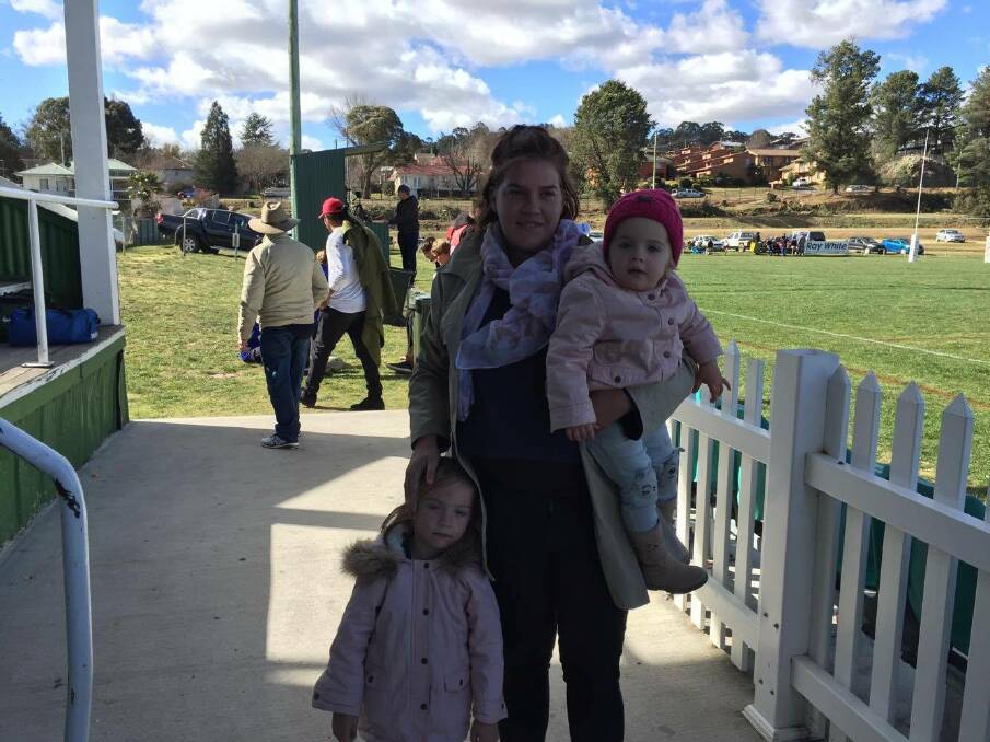 FAMILY FUN: Chloe, Evelyn and Ruby didn't let the cold weather stop them supporting their team on Saturday.