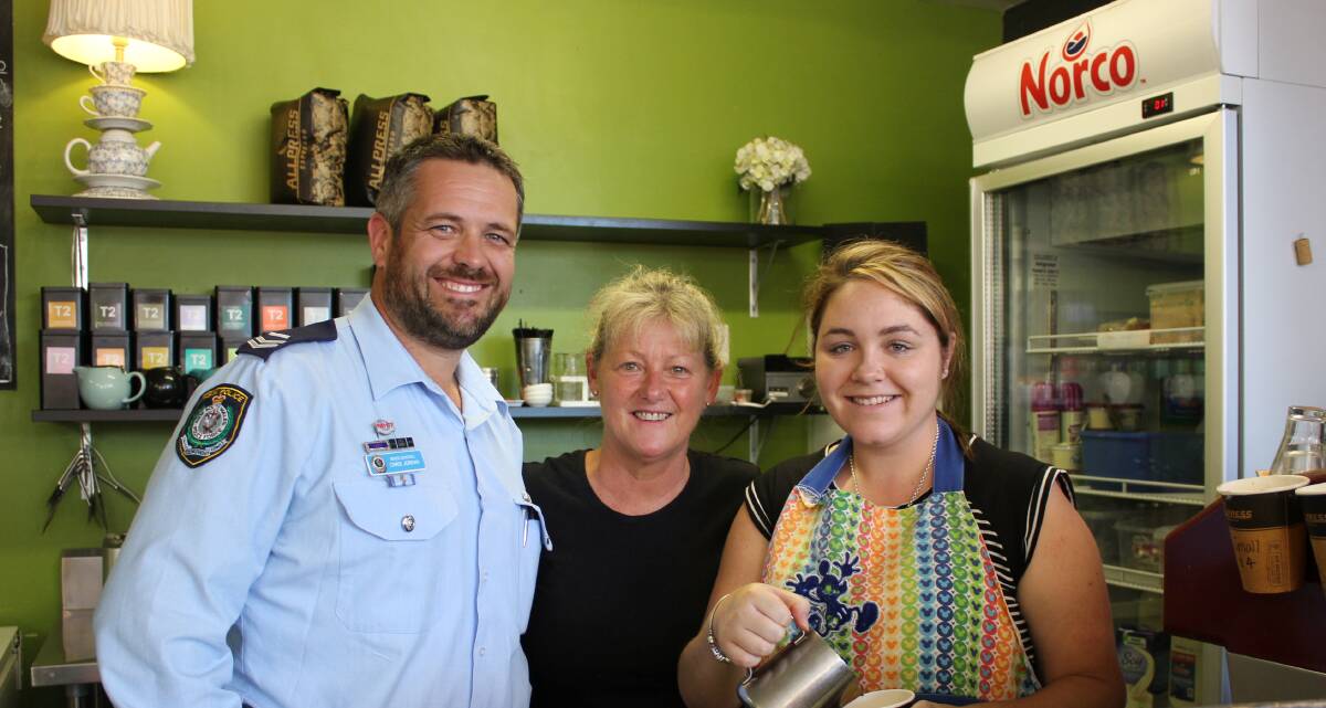 COFFEE WITH A COP: New England Senior Constable Chris Jordan with Prue and Olive staff members Jules Campbell and Allison Zibens.